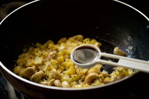 naturally fermented soy sauce added in the wok. 