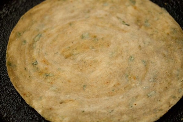 flipped pudina paratha on tawa