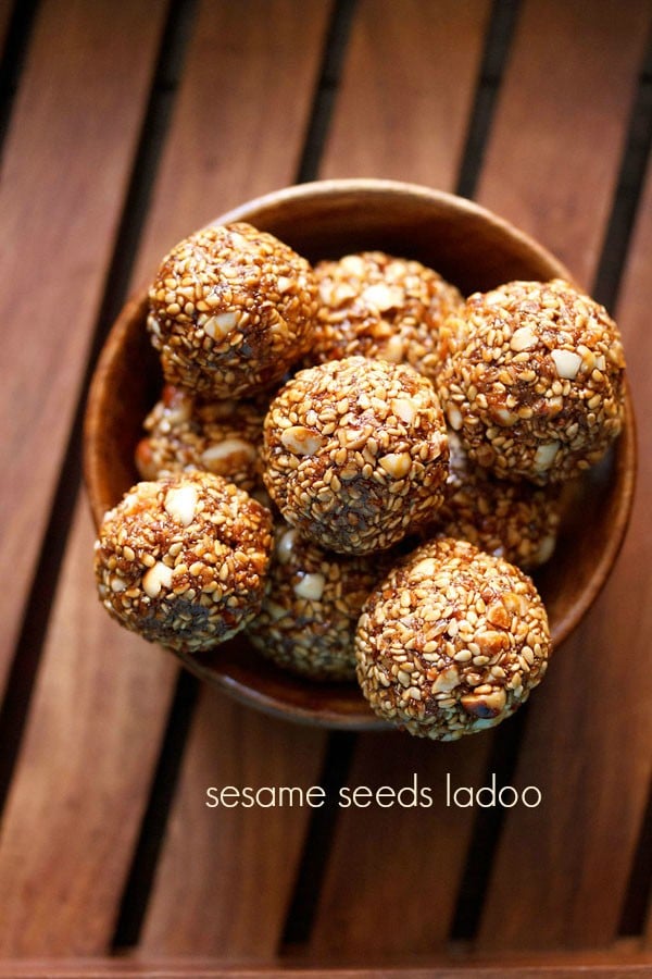 til ke laddu served in a wooden bowl with text layover.