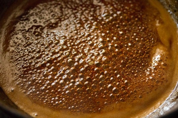 jaggery syrup bubbling. 