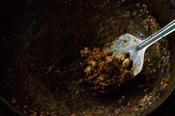 scraping the sides of the pan. 