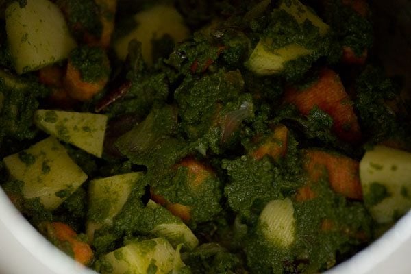 mixing veggies with chutney 