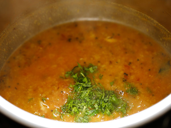 garnishing with coriander leaves