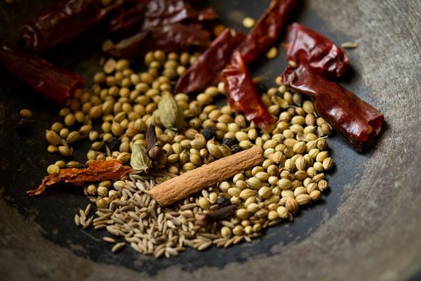 whole spices in a kadai