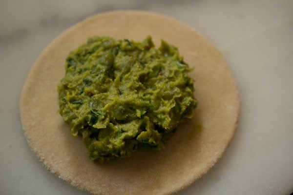 peas stuffing placed on rolled dough