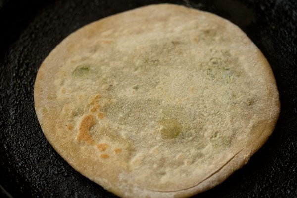 flipped the side of peas paratha