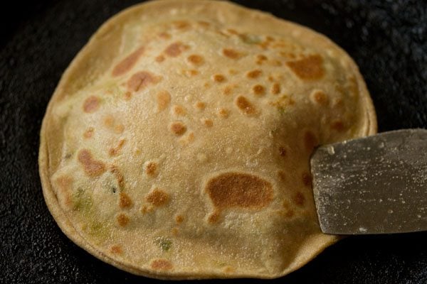 cooking peas paratha