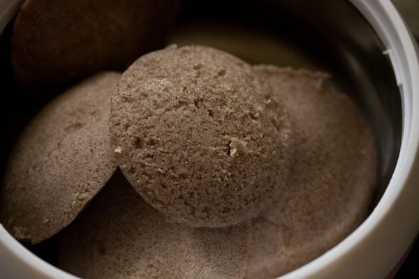 steamed ragi idlis in a casserole. 