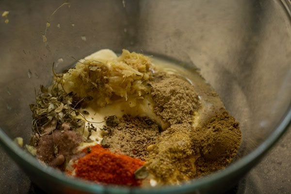 spice powders, crushed dried fenugreek leaves and salt added to the hung curd. 