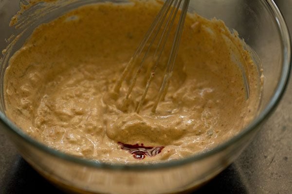 natural orange color extract added to the hung curd marinade. 