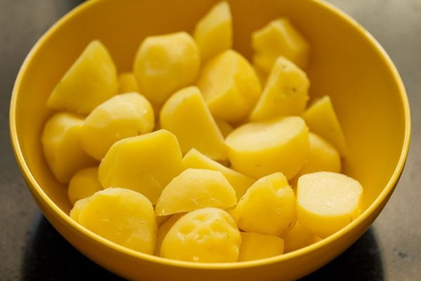 parboiled, peeled and halved baby potatoes for tandoori aloo recipe. 