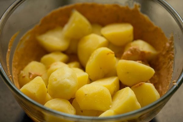 potatoes added to the marinade for tandoori aloo recipe. 