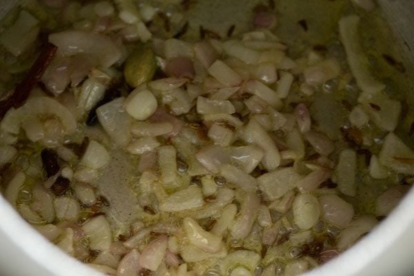 sauteing onions for masala khichdi