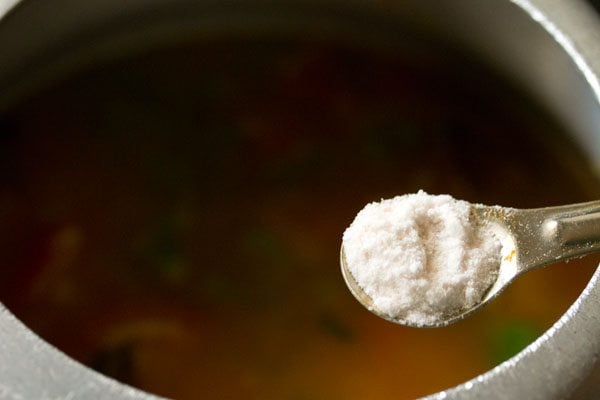 adding salt for masala khichdi recipe