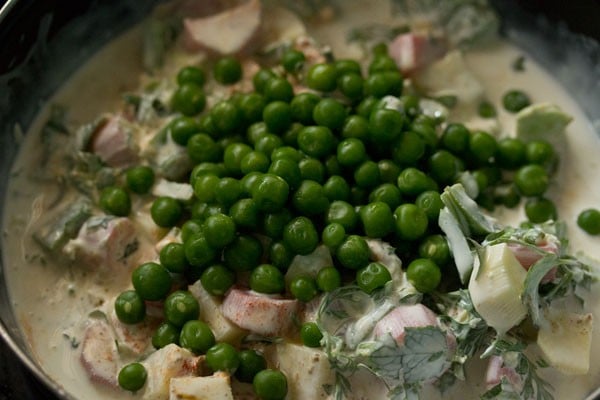 green peas added to coconut milk mixture. 