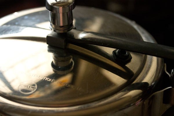 making pressure cooker biryani. 