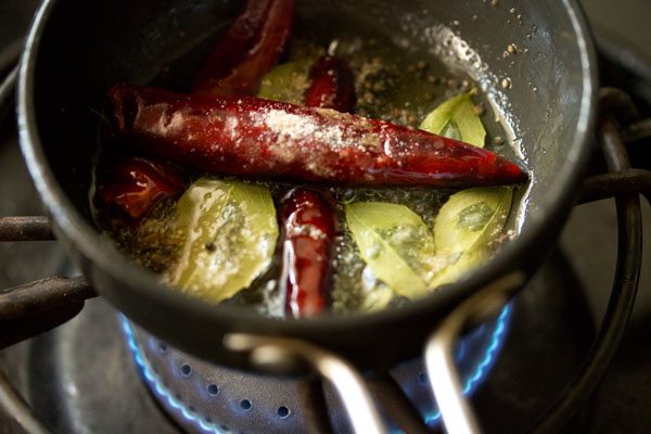 dry red chilies and curry leaves added