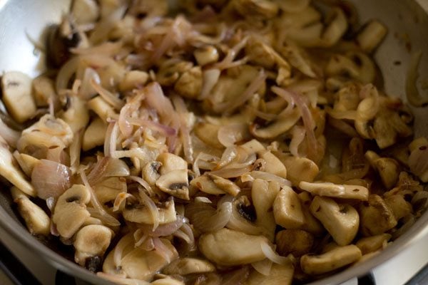 mixing mushrooms with onions