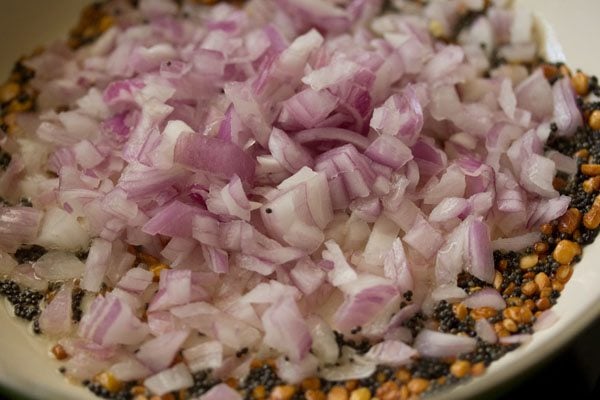 chopped onions added to the pan. 