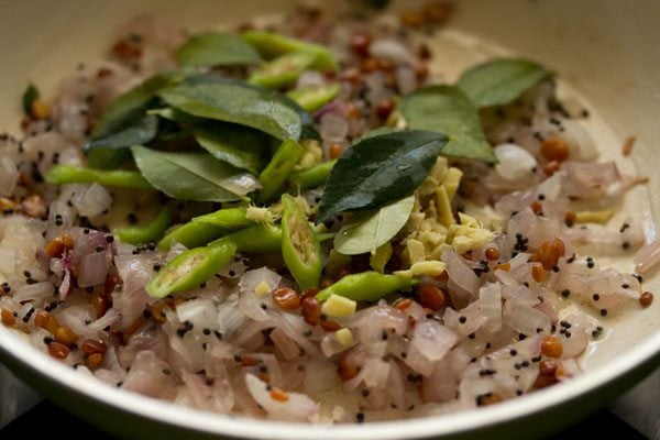 chopped green chilies, chopped ginger and curry leaves added to the onion mixture. 