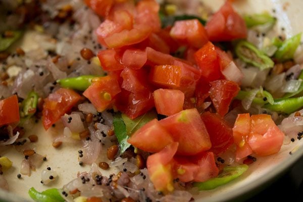 chopped tomatoes added to the onion mixture. 