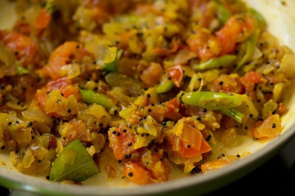 sautéing gram flour-onion-tomato mixture. 