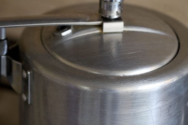 pressure cooker sealed with lid