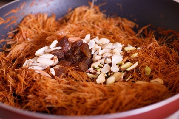 chopped nuts and raisins added to the vermicelli in pan. 