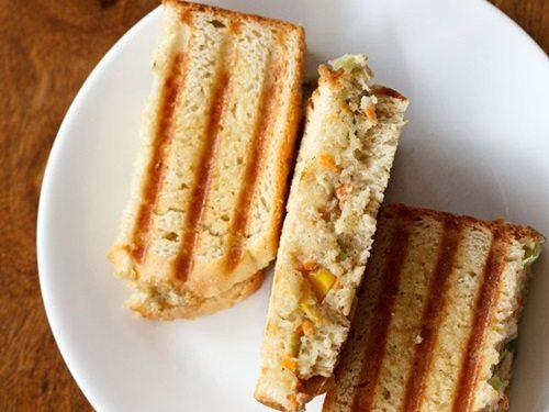 curd sandwich pieces served on a white plate.