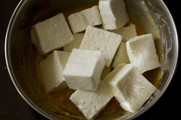 paneer cubes added to the prepared marinade. 