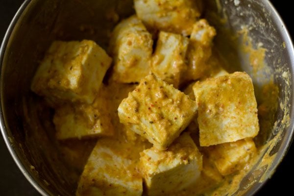 paneer cubes mixed gently with the marinade. 