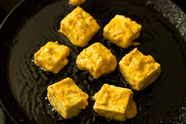 amritsari paneer tikka cubes on tawa