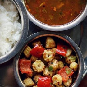 baby corn fry served in a bowl with sambar and rice.