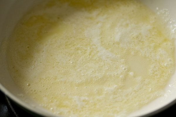 melting butter in hot pan for butter mushroom. 
