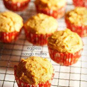 mango muffins placed on a wired tray with text layovers.