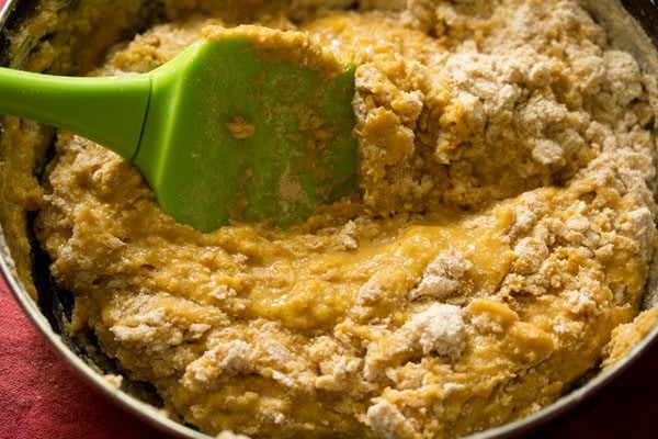 folding the mango-flour mixture. 