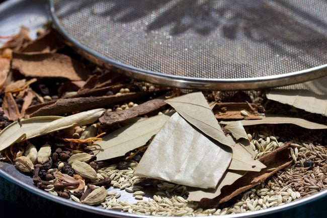 whole spices being sun dried. 