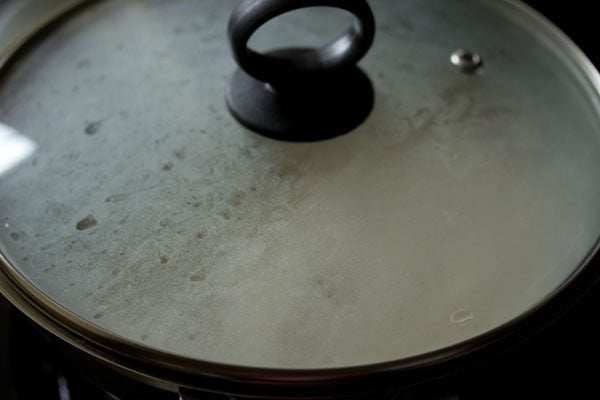 covering the pan and cooling the phirni mixture to room temperature. 