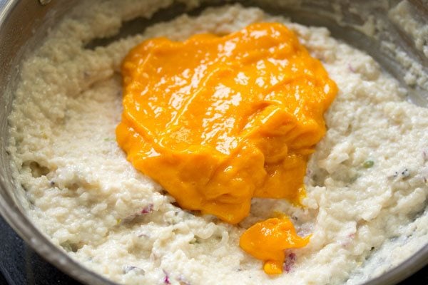 mango puree added to the cooled phirni mixture. 