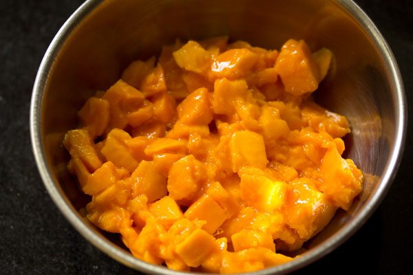 chopped mangoes in a bowl. 