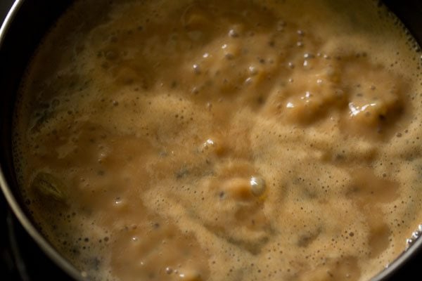 Masala chai with milk simmering