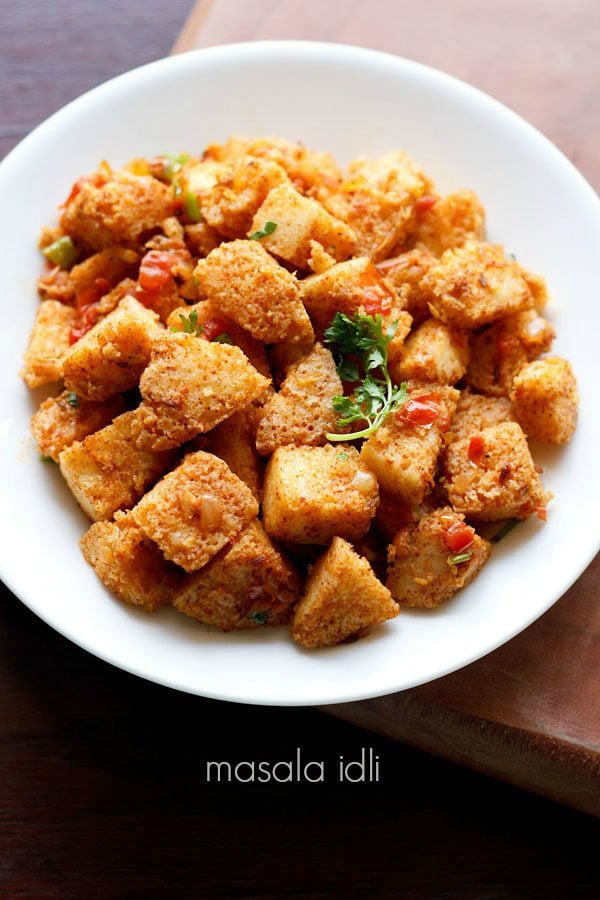 masala idli on a white plate.