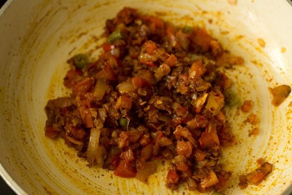 mixing spices with masala