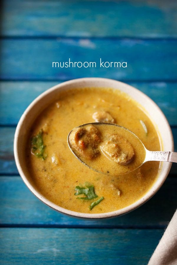 mushroom kurma served in a white bowl with a spoonful of kurma and text layover.