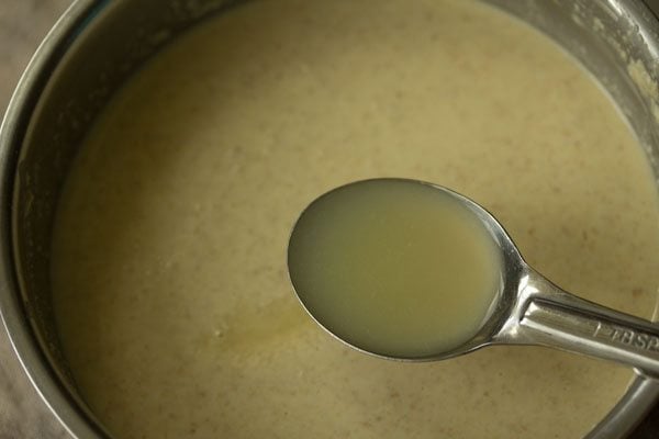 adding lemon juice to batter. 