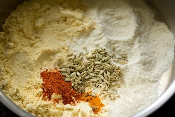 fennels seeds, turmeric powder and red chili powder added to flour mixture. 