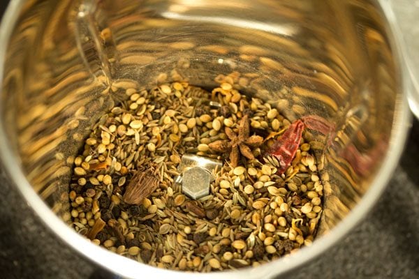 sun dried whole spices in a dry grinder jar. 