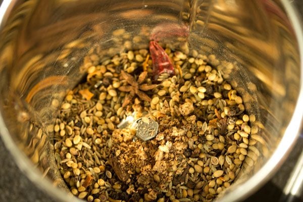 crushed nutmeg added to the grinder jar. 