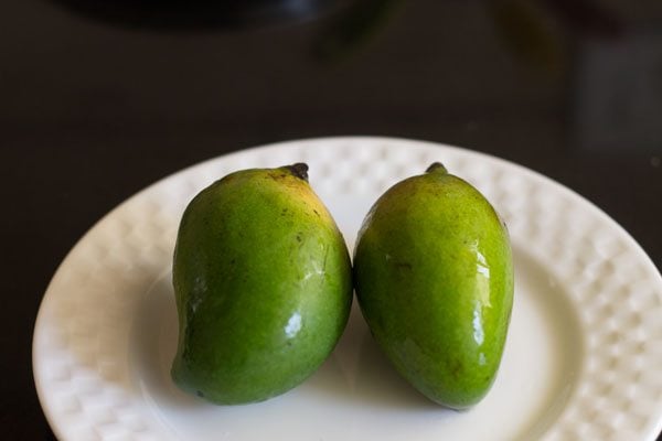 rinsed raw mangoes for mango salad.