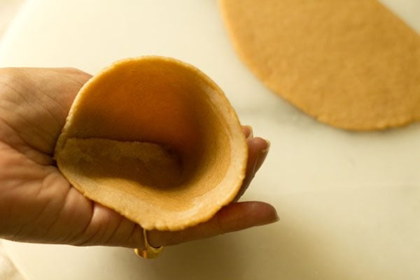 pastry disc shaped into a cone. 